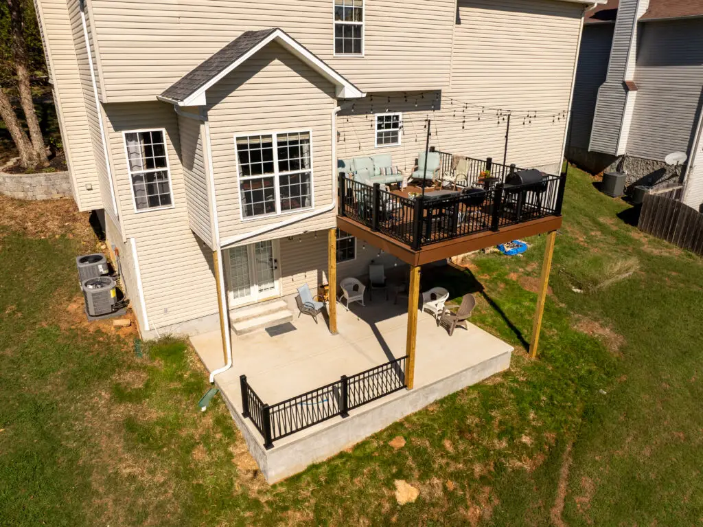 Anchored Construction concrete driveway and retaining wall